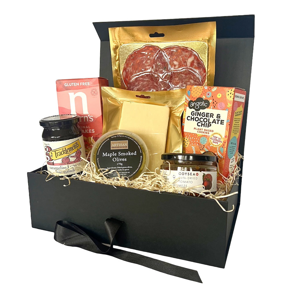 The Artisan Smokehouse's small Gluten Free Hamper containing smoked cheese, gluten free crackers, chutney, olives, salami and biscuits