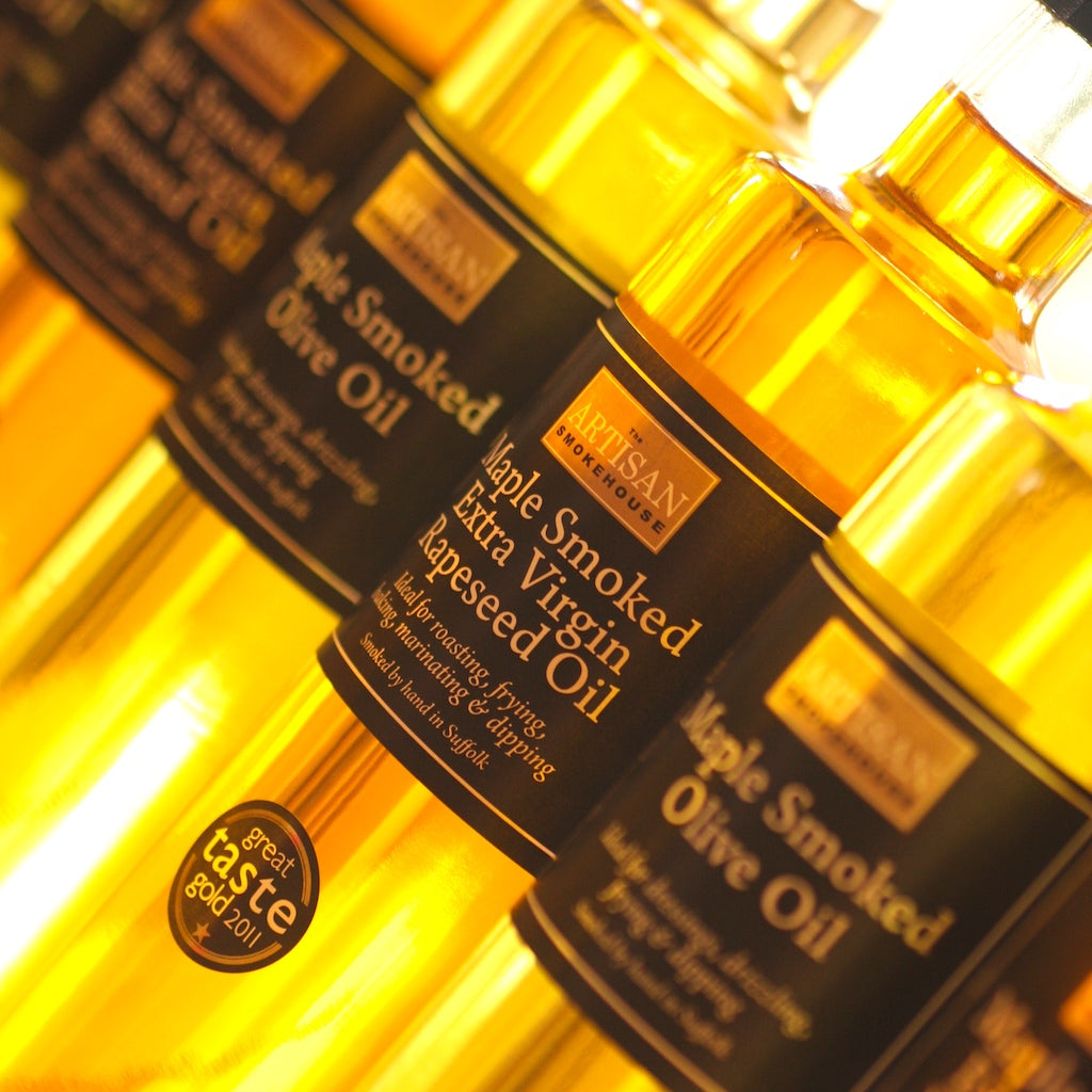 Bottles of The Artisan Smokehouse's smoked Suffolk rapeseed oil and smoked Italian olive oil 