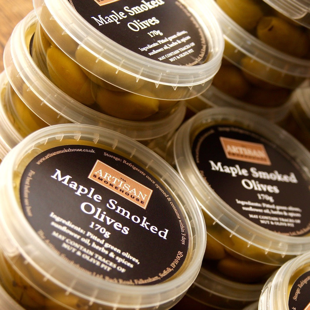 A stack of The Artisan Smokehouses's smoked olives