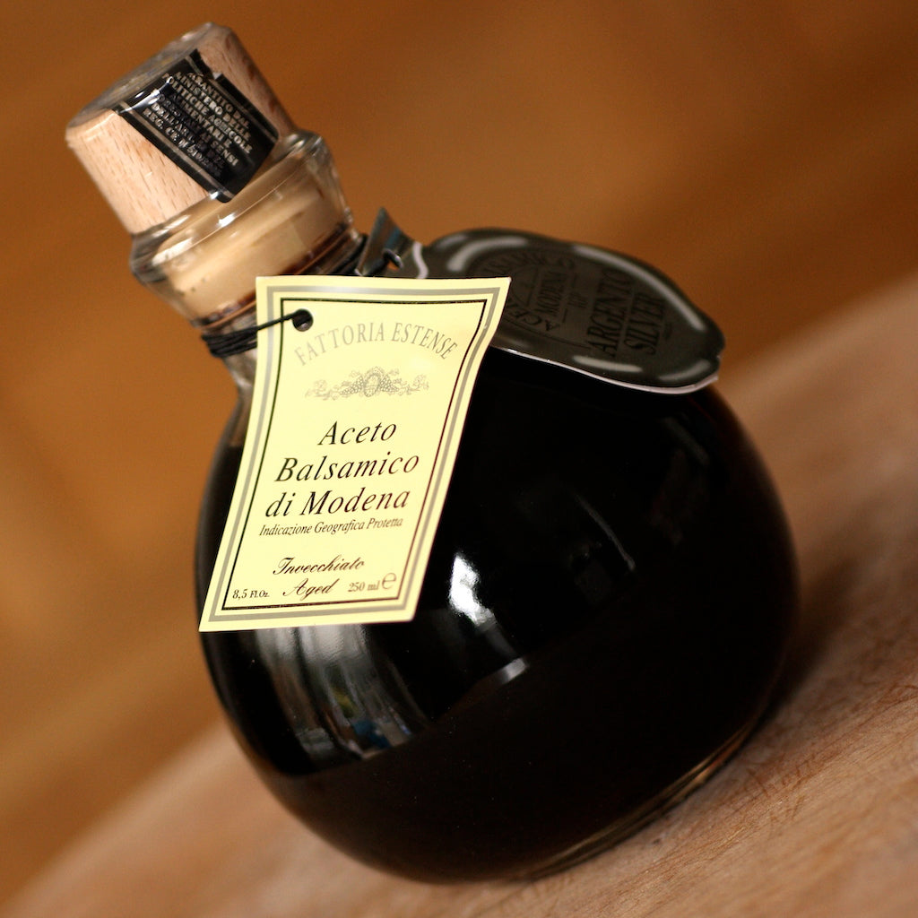 A bottle of Fattoria Estense Silver Label Aged Balsamic Vinegar on board