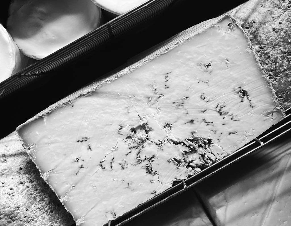 A block of the Artisan Smokehouse smoked Stilton in the smoker