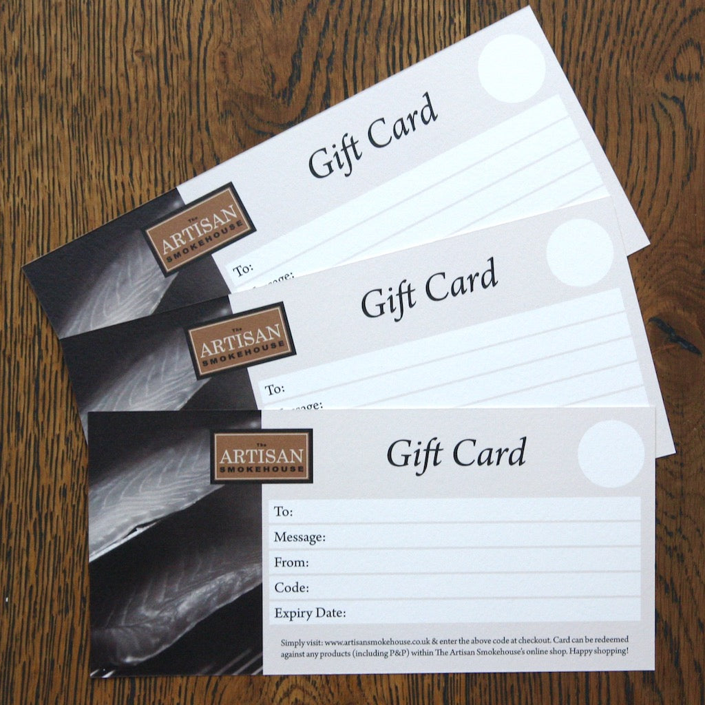 A pile of the Artisan Smokehouse gift cards