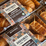 Packaged chocolate cannoncini with Diforti branding on a wooden surface