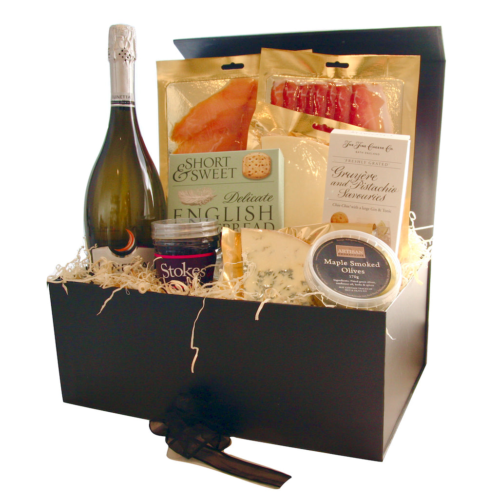 The Artisan Smokehouse's Celebration Hamper containing Prosecco, smoked meats, salmon, cheese, crackers, chutney, olives and biscuits