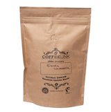 A brown kraft paper stand-up pouch of Coffeelink coffee beans on a plain white background.