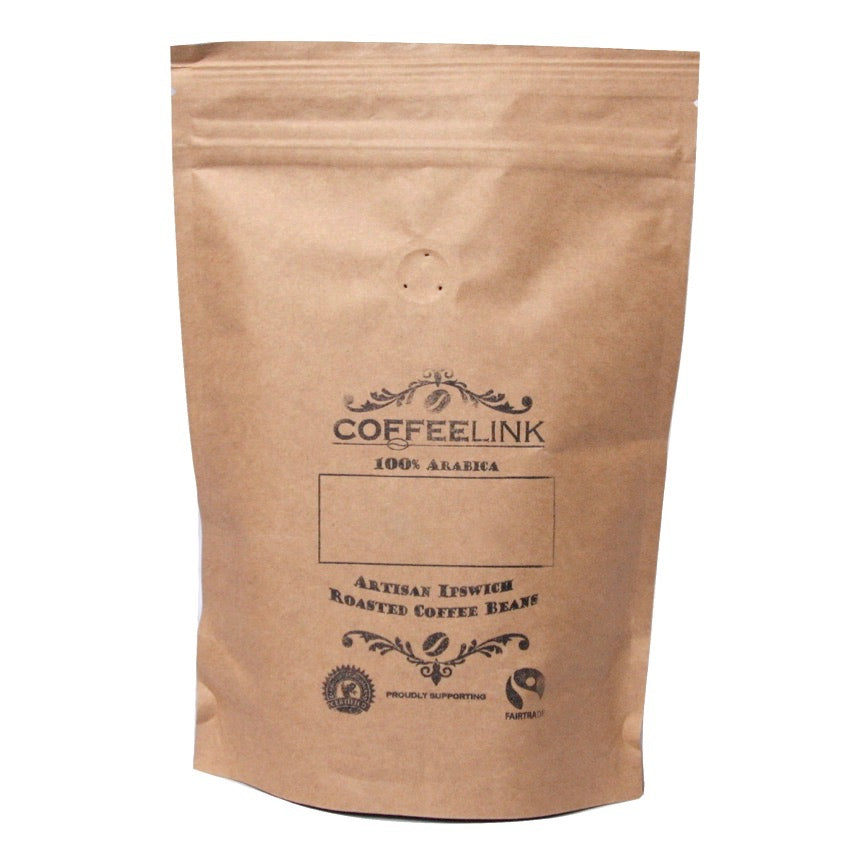 A brown kraft paper stand-up pouch of Coffeelink coffee beans on a plain white background.