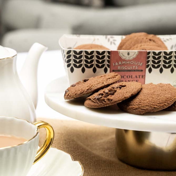 A packet and plate of chocolate biscuits
