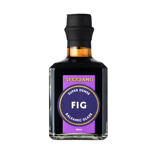 A bottle of Seggiano Fig Balsamic Glaze with a black cap and a purple label, shown on a plain white background.
