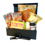 Hamper For her with various items including Tony's chocolate, smoked salmon, and other snacks.