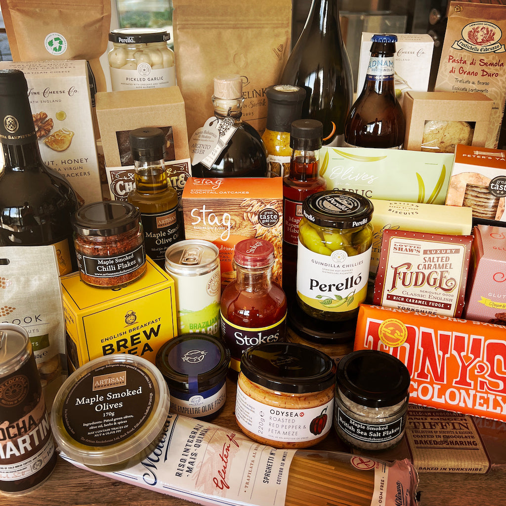 Lots of Artisan Smokehouse pantry items and dried goods on display