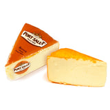 Two wedges of Port Salut cheese on a white background