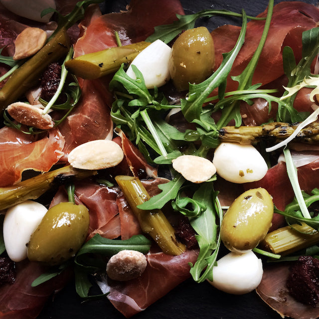 Smoked Prosciutto, asparagus & almond salad with smoked olives