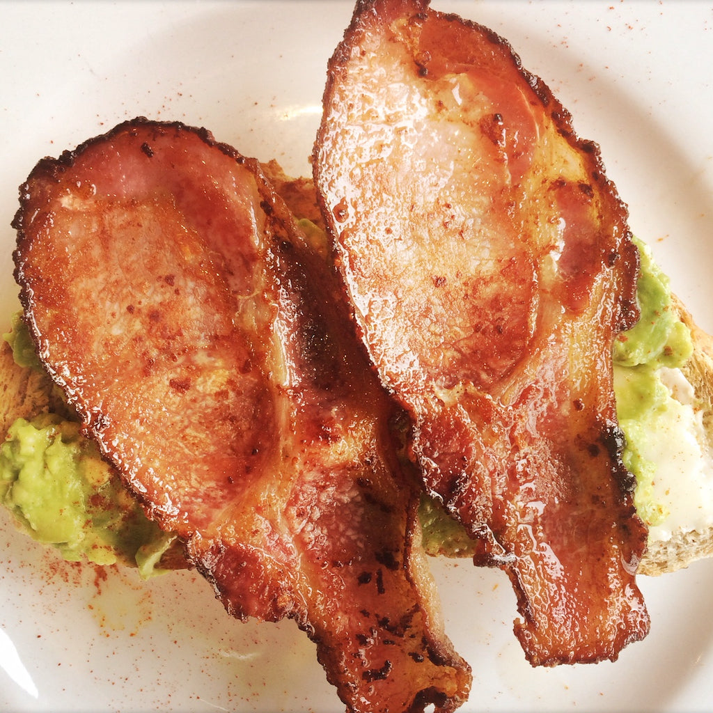 Artisan Smokehouse smoked back bacon on toast with crushed avocado