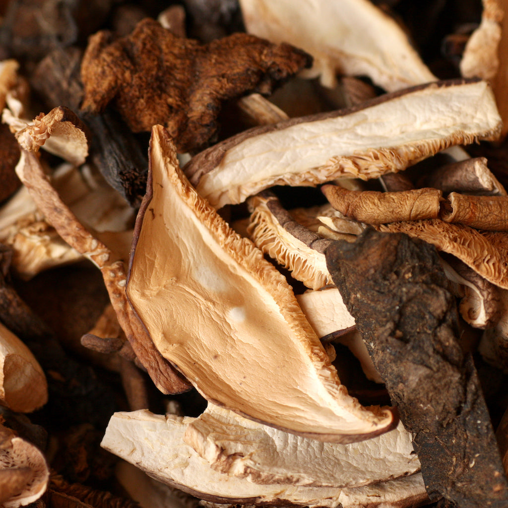 The Artisan Smokehouse's maple smoked dried forest mushrooms on chopping board