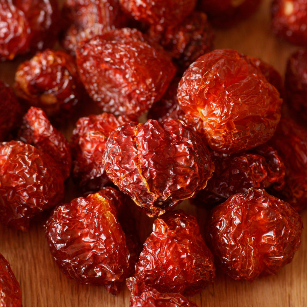 The Artisan Smokehouse's smoked dried habanero chillies on chopping board