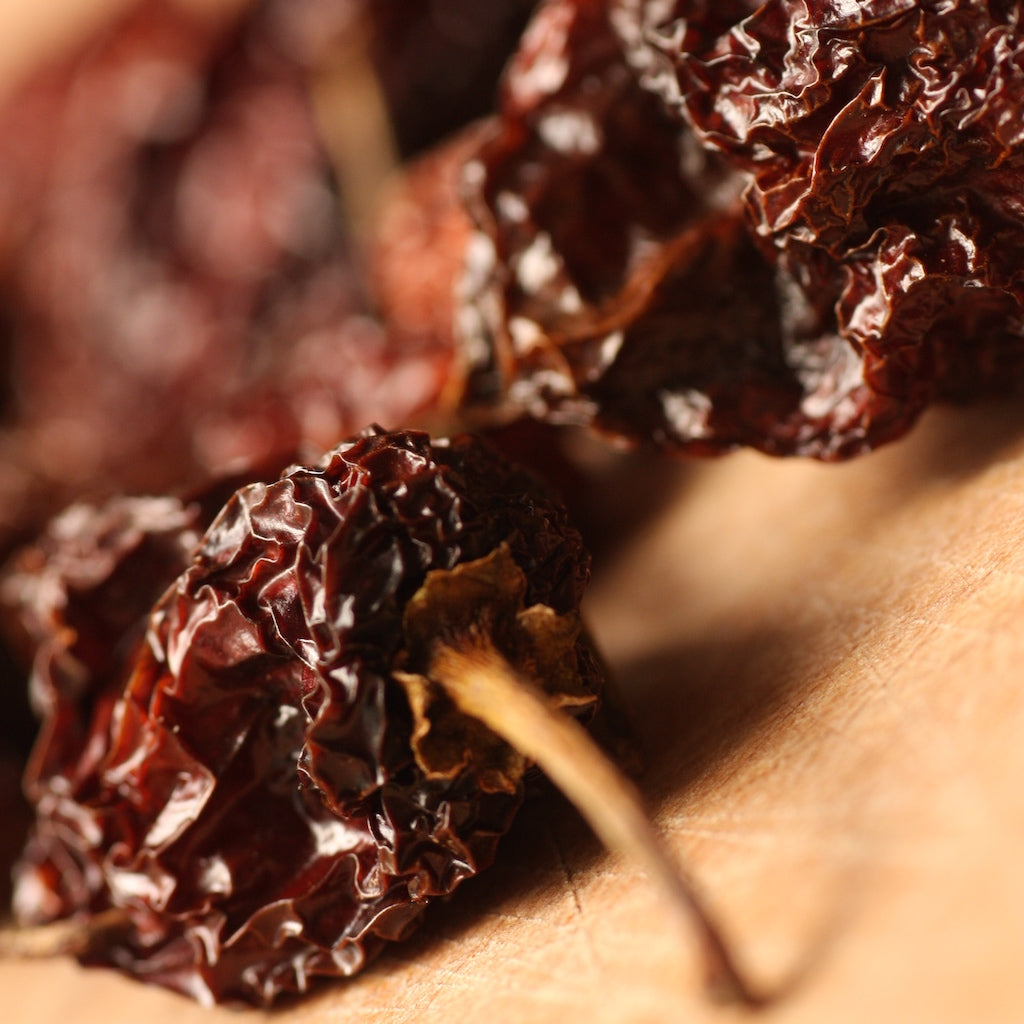 The Artisan Smokehouse's dried and smoked habanero chillies on chopping board