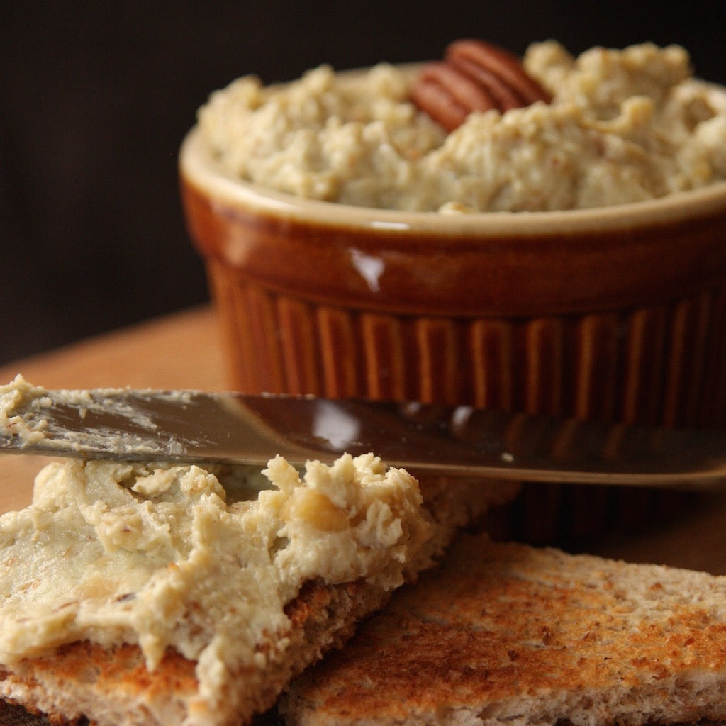 Smoked Stilton and pecan nut pate in ramekin with toast