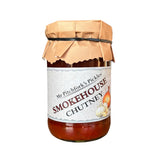 Jar of Smokehouse Chutney with a paper cover on a white background