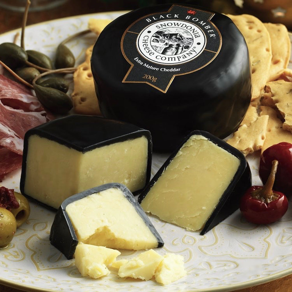 A Snowdonia Black Bomber cheese with crackers