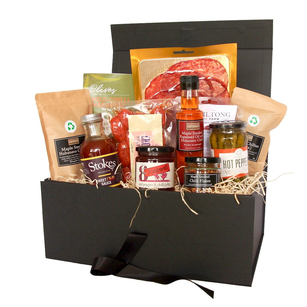 The Artisan Smokehouse's Spicy Hamper containing chorizo, spicy salami, chilli oil, jam nut, olives and dried chillies