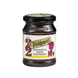 A glass jar of Tracklements Caramelised Onion Marmalade, shown on a plain white background.