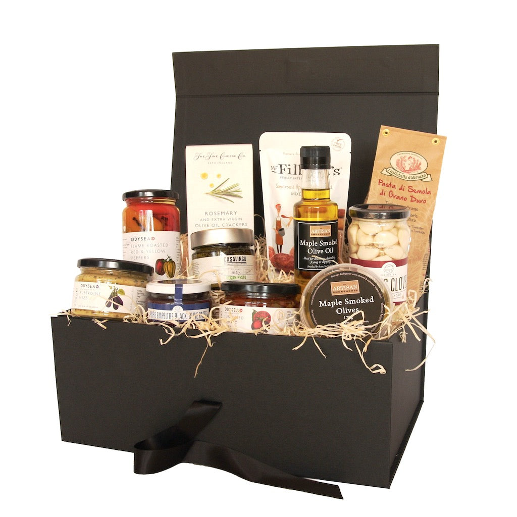 The Artisan Smokehouse's Vegan Mediterranean Hamper containing oils, meze, smoked olives, nuts, crackers and smoked oil