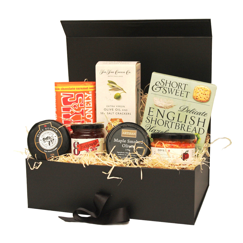 The Artisan Smokehouse's small Vegetarian Hamper containing cheese, crackers, chutney, crackers and biscuits