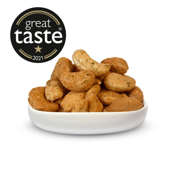 A bowl full of baked chilli and lime nuts