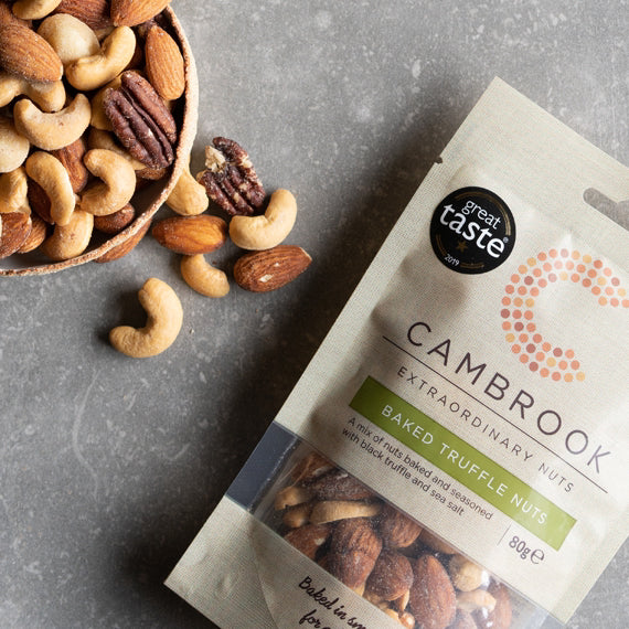 A dish and packet of Cambrook Baked Truffle Nuts 