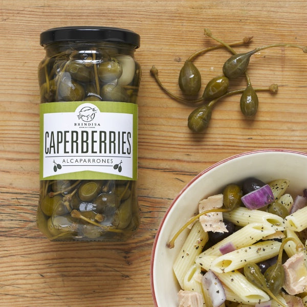 Caperberries in jar and served with pasta